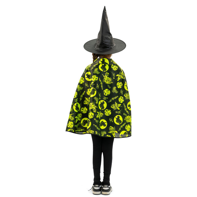 Achterzijde van de fluo Halloween cape met gele cirkels, heksen en katten op zwart