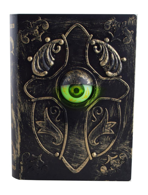 Boek met boze oog met groen oog achter gewelfde lens, decoratie voor Halloween