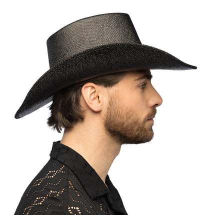 Cowboyhoed Midnight zwart van opzij gedragen door een man, brede glinsterende rand voor een westernfeest