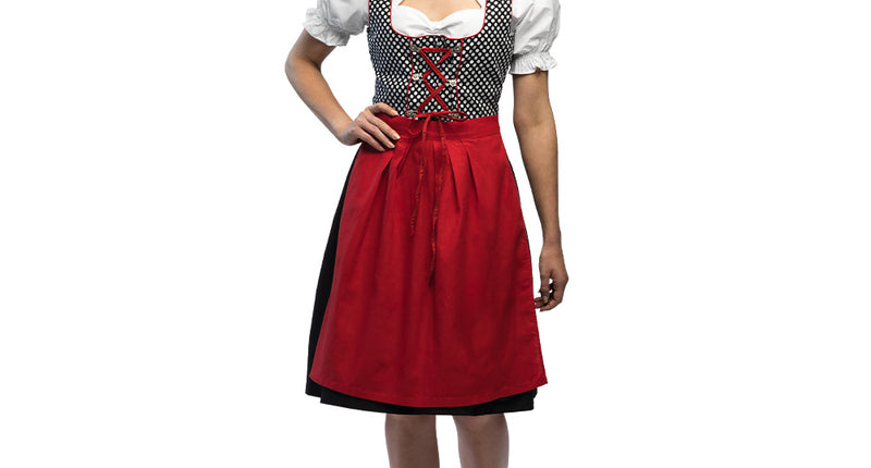 Dirndl Frau Müller dames: zwarte jurk met wit gestipt lijfje, wit topje en rode schort voor Oktoberfest