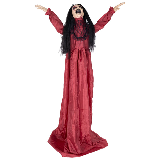 Gillend spookmeisje animatronic met wijd open mond en zwart kanten kraag in halloweendecor