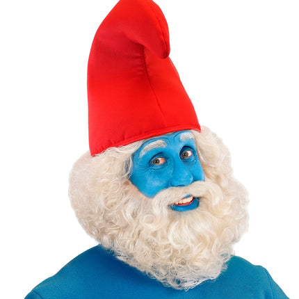 Hoed dwerg rood op het hoofd bij witte krulbaard en blauw geschminkt gezicht