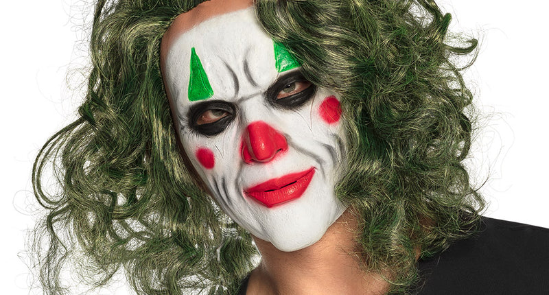 Latex hoofdmasker De Schurk met wit clownsgezicht, rode lach en groene krullen voor Halloween