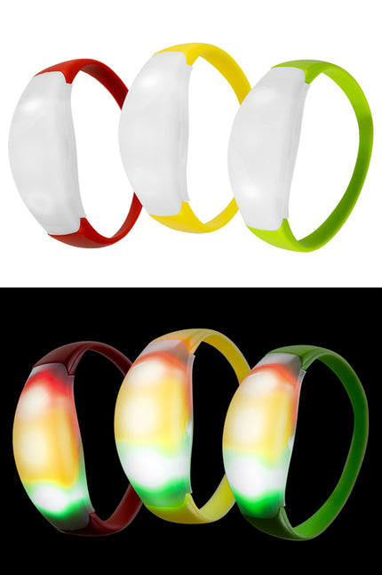 Led armbanden rood, geel en groen met witte kap, uit en oplichtend in het donker