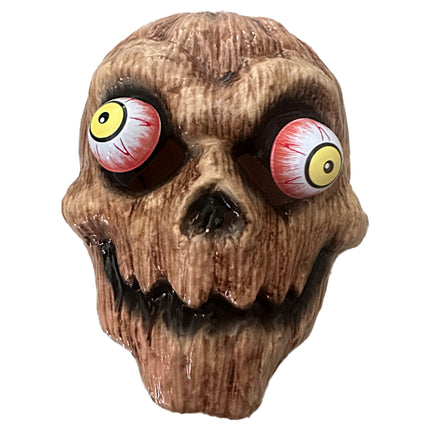 Masker zombie van pvc in bruin met uitpuilende gele ogen en grijnzende tanden voor Halloween