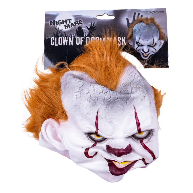 Pennywise clownsmasker zijkant met ruig oranje haar en donkerrode grijns, in verpakking