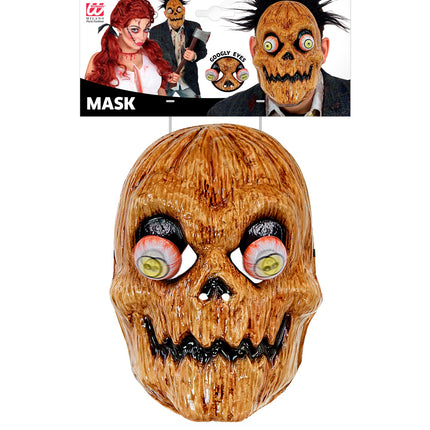 Pompoenmasker Timo op verpakkingskaart, met detail van de wiebelende oogbollen