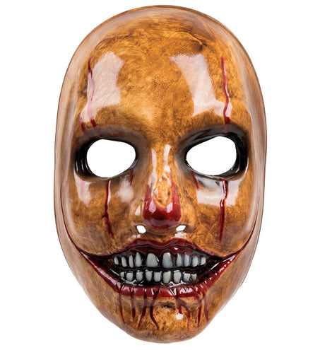 Psycho clown masker van pvc met okerbruin gezicht, bloederige grijns en grijze tanden