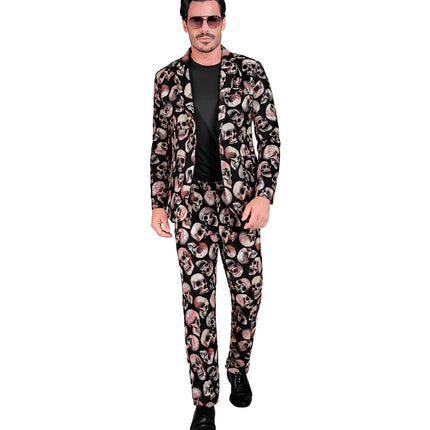 Schedels kostuum heren met open colbert over zwart shirt, schedelprint in bot en roze tinten