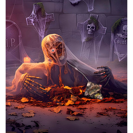 Skelet zombie groundbreaker tussen herfstbladeren als kerkhofdecoratie voor Halloween