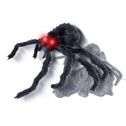 Springende spin van 50 cm in zwart met rood oplichtende ogen en grijs gaas als web, halloweendecoratie