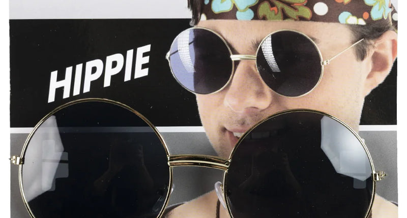 Uilebril goud met extra grote ronde zwarte glazen en dun montuur, op kaart met hippieprint