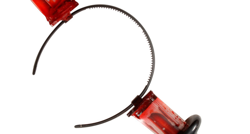 Widmann SRL Mes door hoofd met bloed diadeem