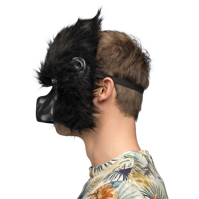 Zijkant van het zwarte gorilla halfmasker met elastiek achter het hoofd en vrije kin