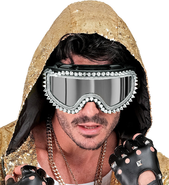 Zilveren skibril met studs bij goudkleurige pailletten capuchon, jaren 80-look
