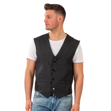 Zwart vest voor heren, mouwloos gilet met V-hals, vier knopen en twee paspelzakjes, gedragen op jeans